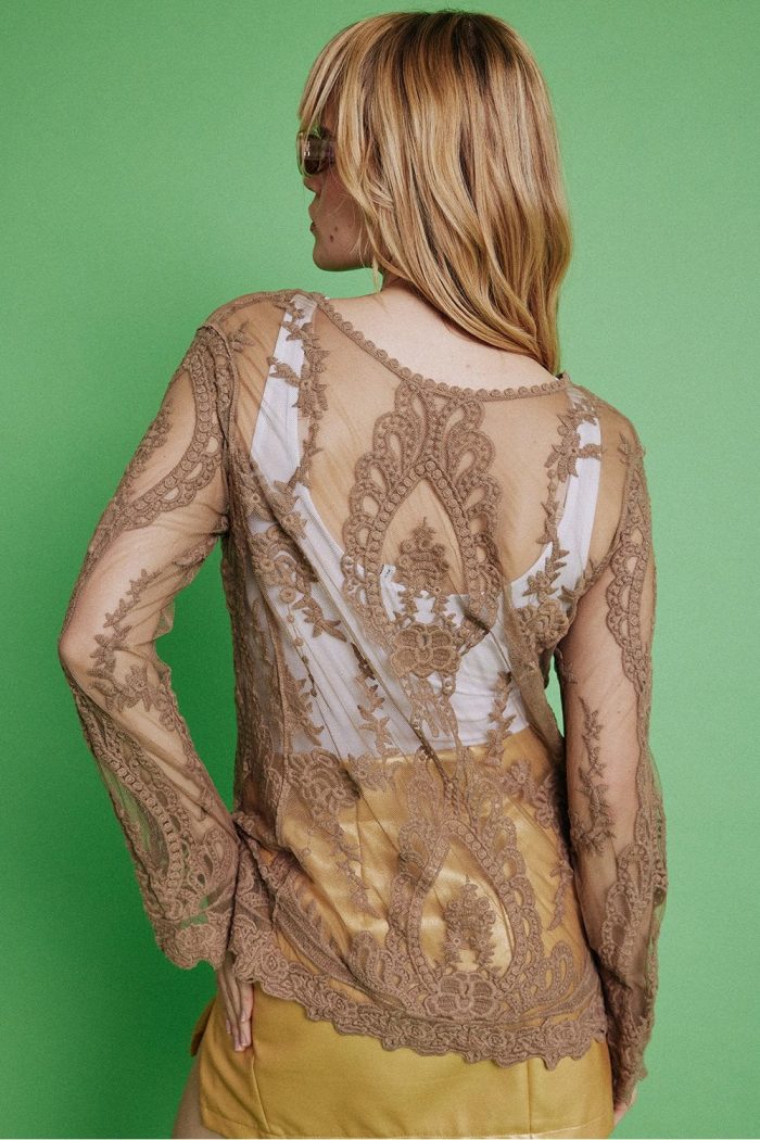 Woman wearing a lace top