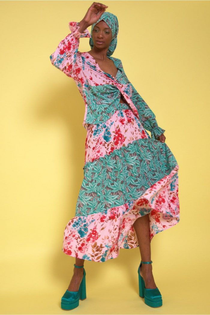 Woman wearing statement blouse and dress
